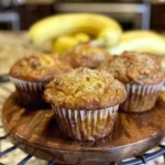 Freshly baked sourdough banana muffins with a golden crust