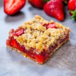 Strawberry Oatmeal Crumble Bars – A Simple, Wholesome Dessert Everyone Loves 8 Strawberry oatmeal crumble bars with fresh strawberries and golden oat topping
